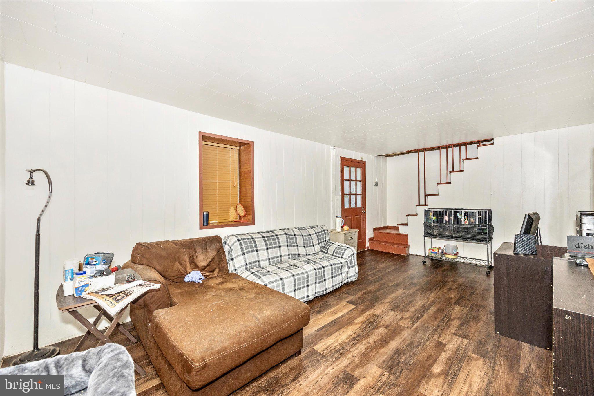 14721 Albert Staub Road Thurmont, MD 21788 - Photo 11 of 46 a living room with furniture and a couch