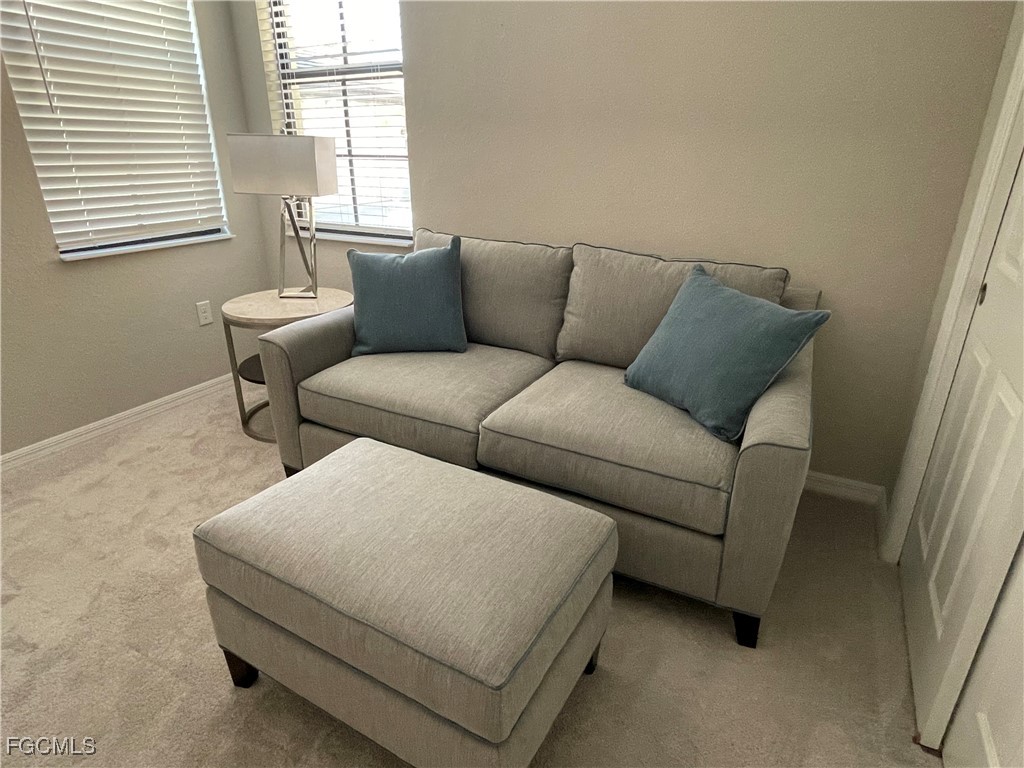 10529 Casella Way, Unit 102 Fort Myers, FL 33913 - Photo 10 of 14 a living room with furniture and a window