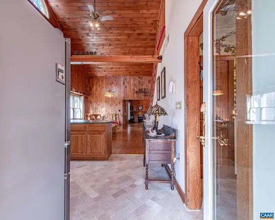 a kitchen with sink cabinets and appliances