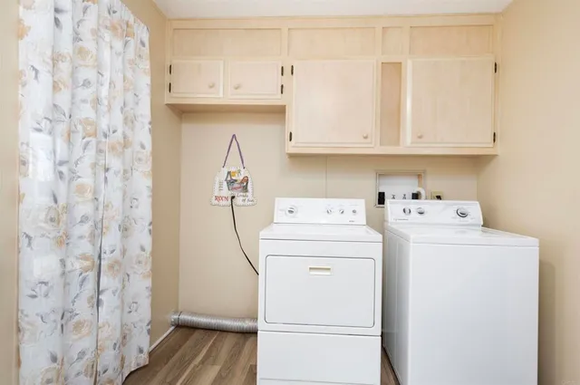 a utility room with dryer and washer