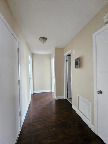 a view of entryway with wooden floor