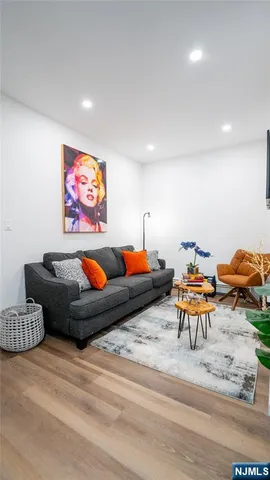 a living room with furniture and a couch