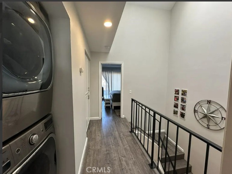 8717 Spring Canyon Drive Spring Valley, CA 91977 - Photo 13 of 34 a view of a hallway with wooden floor