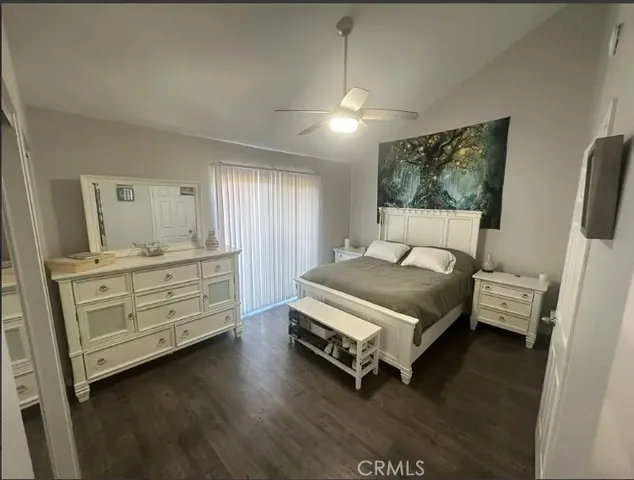 a bedroom with a bed and furniture