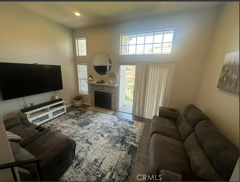 8717 Spring Canyon Drive Spring Valley, CA 91977 - Photo 9 of 34 a living room with furniture and a flat screen tv