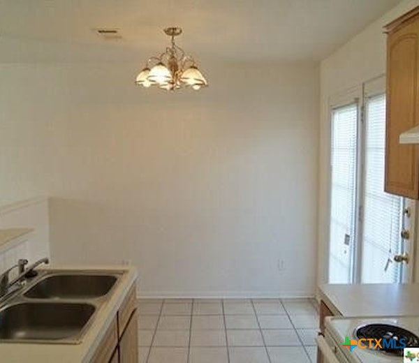 1601 Dugger Circle Killeen, TX 76543 - Photo 5 of 15 a view of a kitchen with a sink