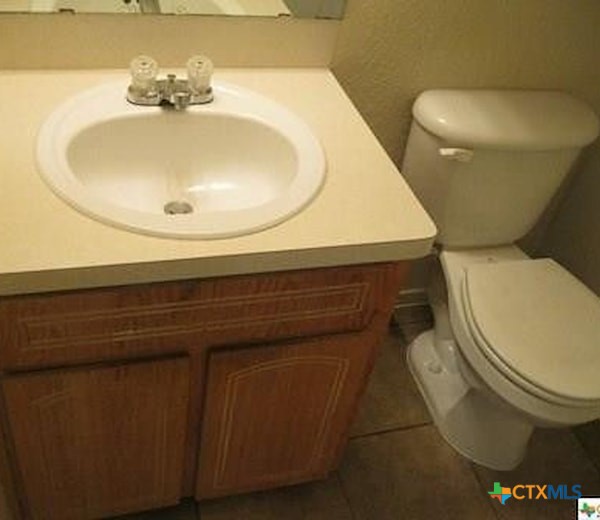 1601 Dugger Circle Killeen, TX 76543 - Photo 7 of 15 a bathroom with a toilet and a sink