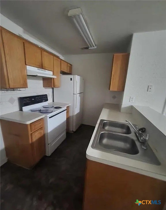 1601 Dugger Circle Killeen, TX 76543 - Photo 8 of 15 a kitchen that has a sink and a stove