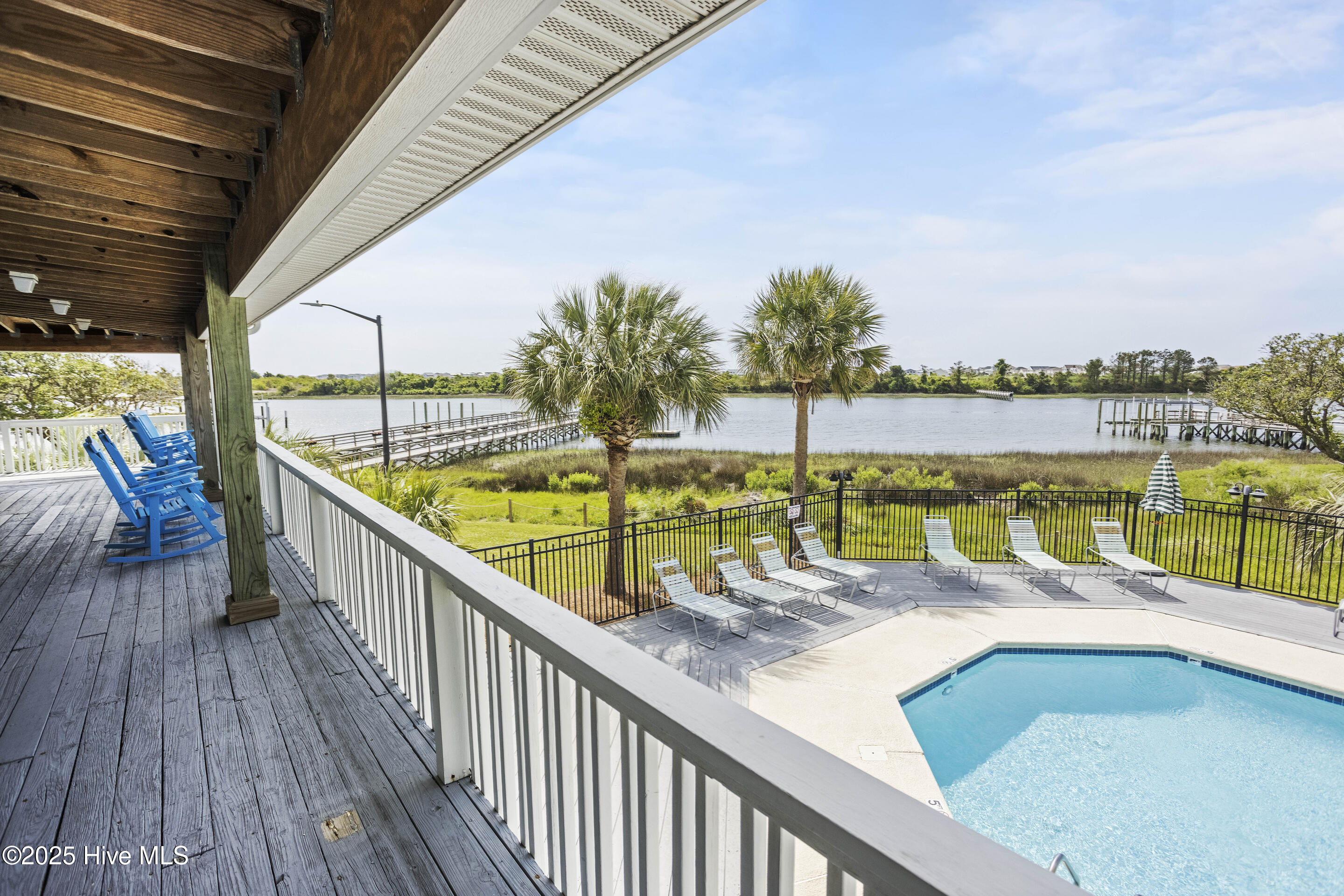 1748 Heron Point Road Southwest Ocean Isle Beach, NC 28469 - Photo 17 of 20 Clubhouse Deck Overlooking Pool & ICW...