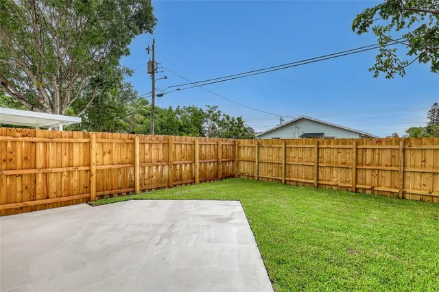 a view of backyard of house