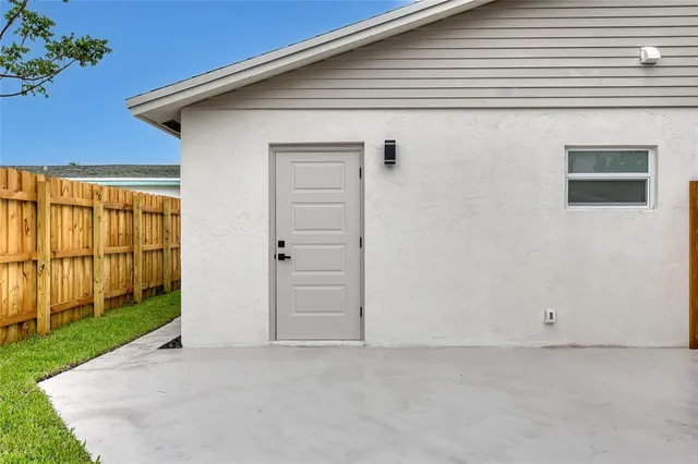 a view of a backyard with plants