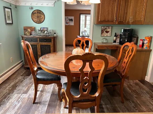 a table and chairs in a kitchen