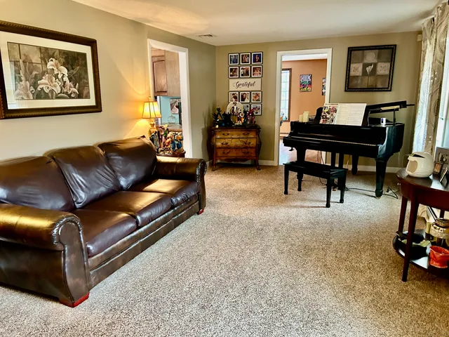 a view of a livingroom with furniture and a couch