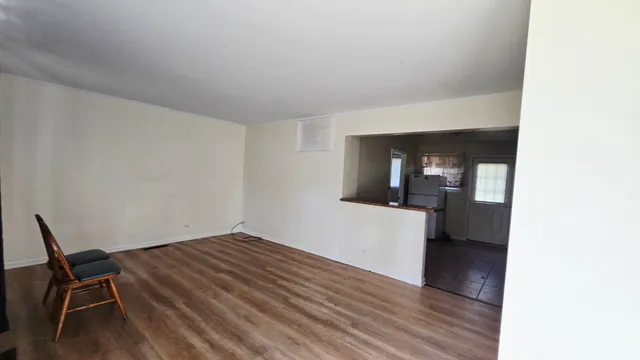 a view of livingroom with furniture and wooden floor