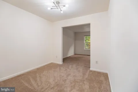 an empty room with a bathroom