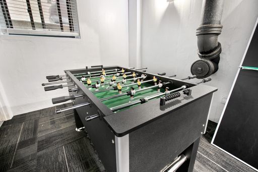 5858 North Sheridan Road, Unit 402 Chicago, IL 60660 - Photo 13 of 16 a kitchen with a stove and a microwave
