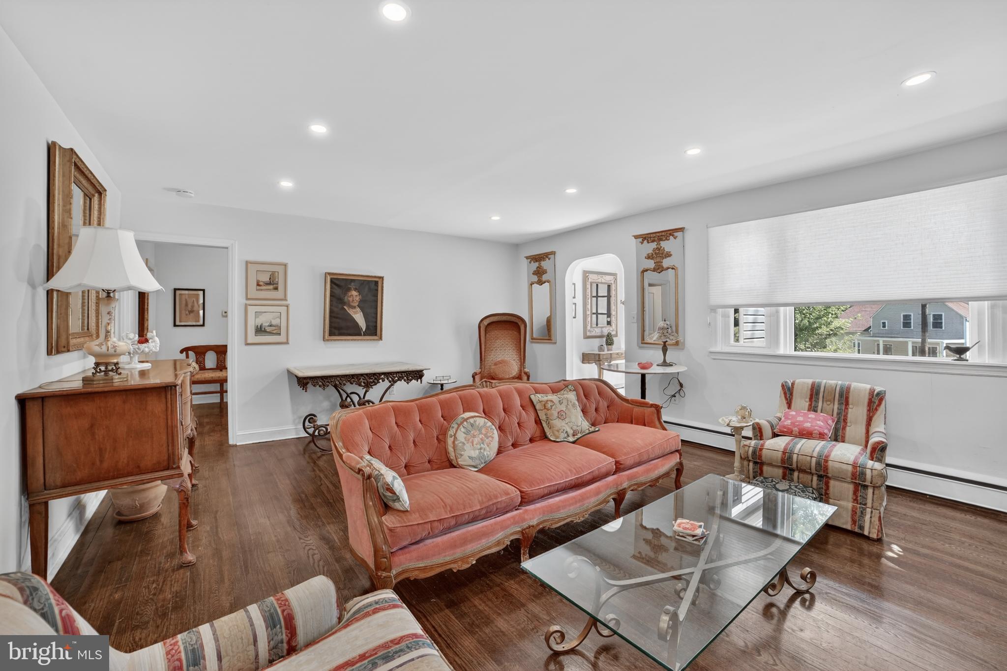 305 Irish Road Berwyn, PA 19312 - Photo 9 of 34 a living room with furniture and a wooden floor