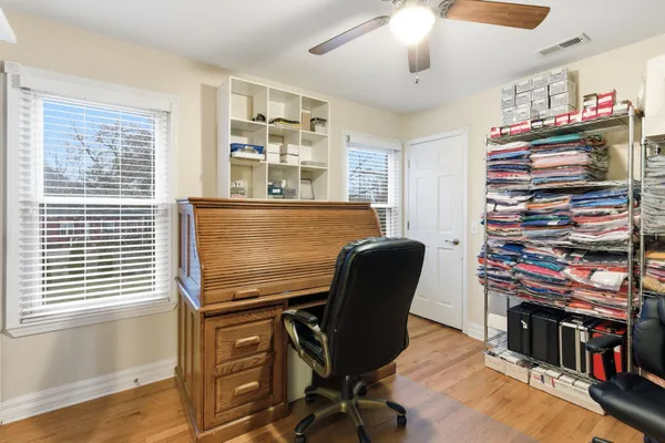 a bathroom with a sink toilet and vanity