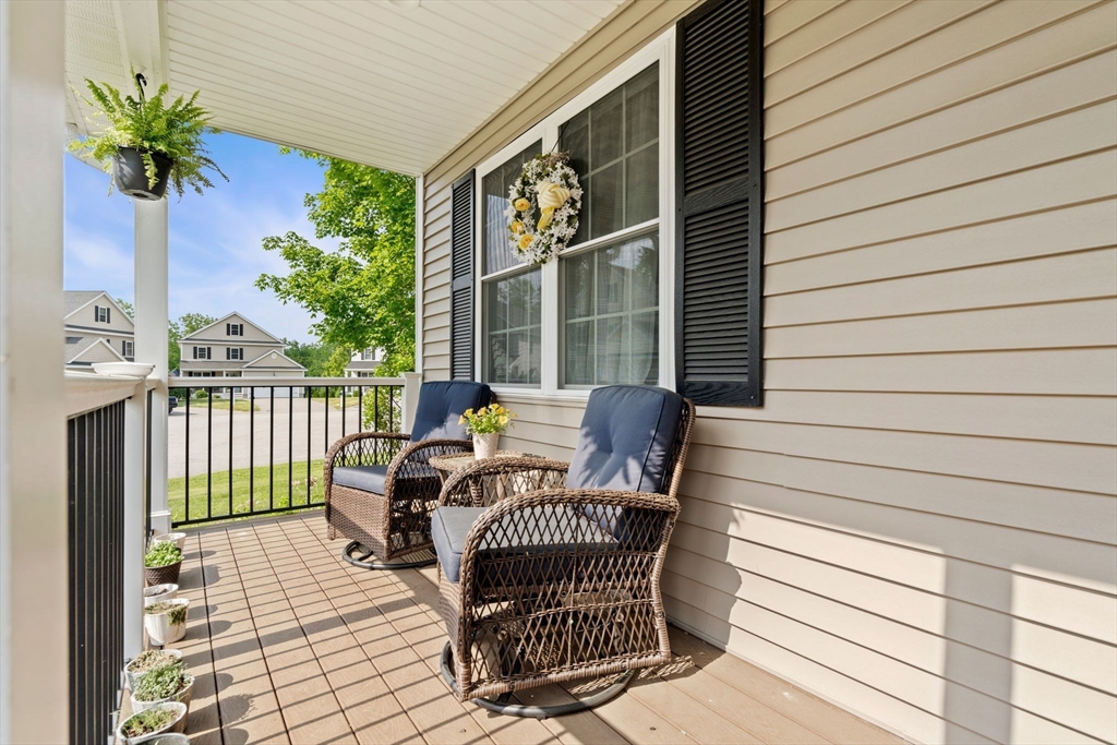 5 Comanche Circle, Unit 5 Haverhill, MA 01835 - Photo 3 of 29 a view of a balcony with chair