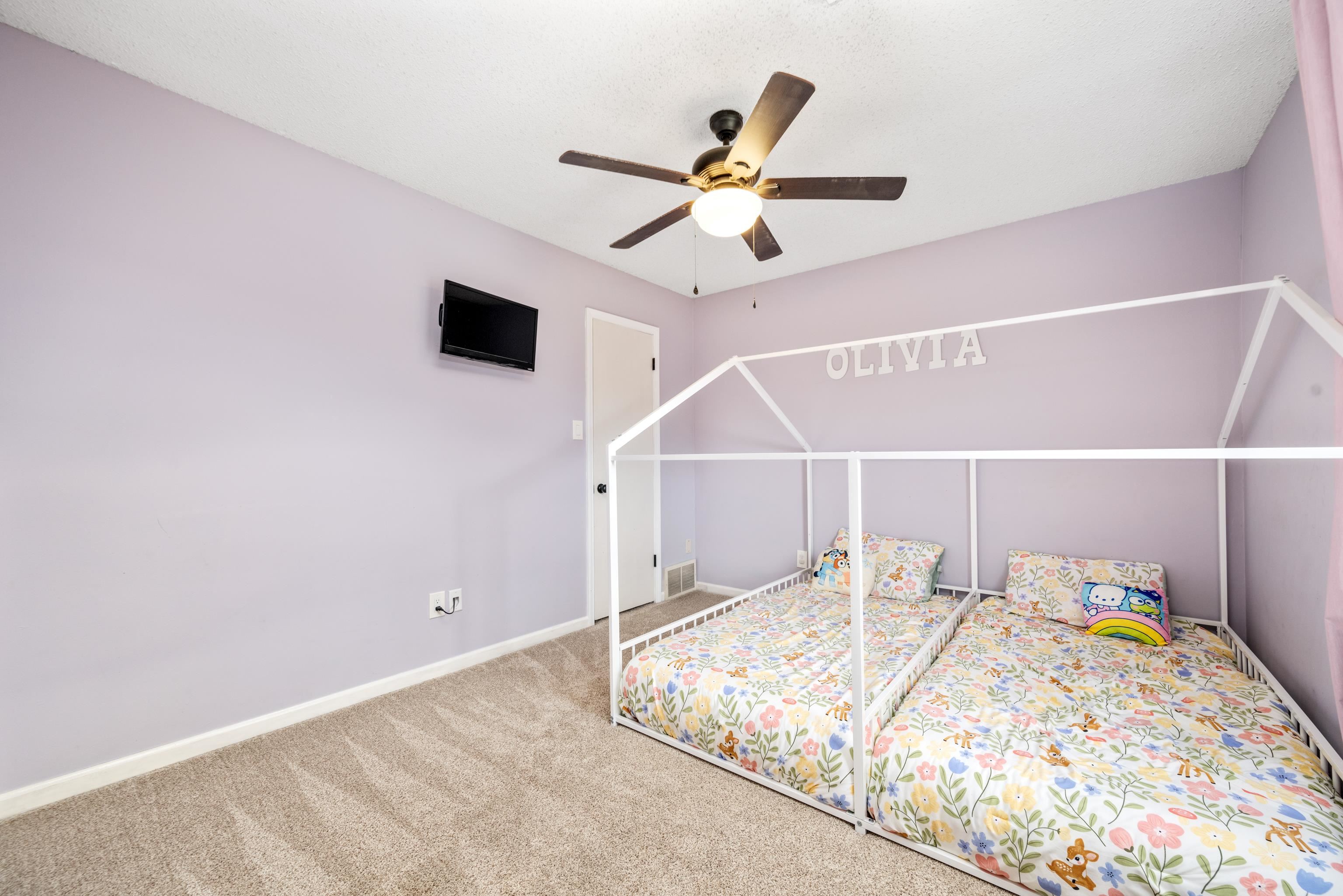 608 King Ridge Cove Collierville, TN 38017 - Photo 21 of 32 Bedroom with light colored carpet and ceiling fan