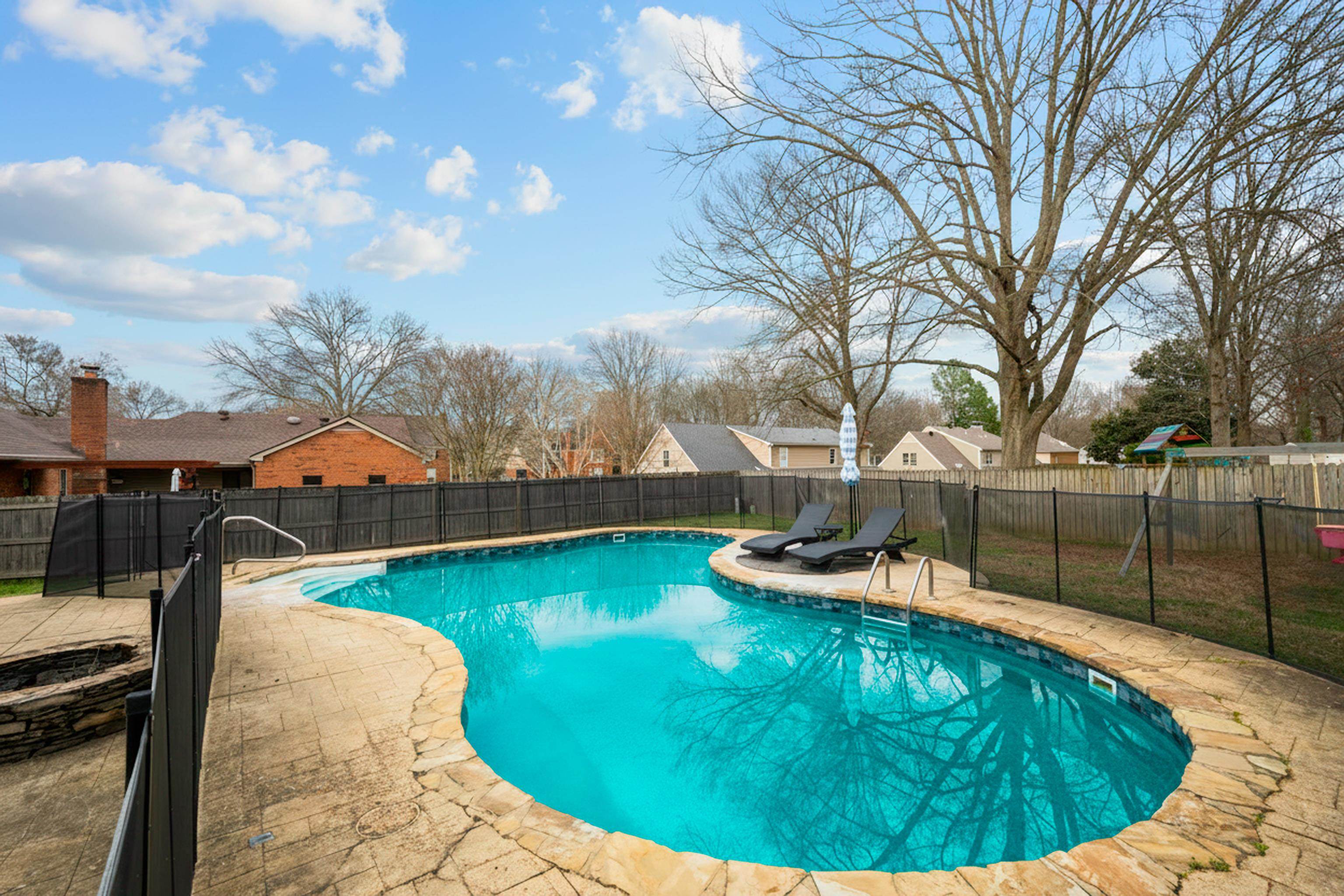 608 King Ridge Cove Collierville, TN 38017 - Photo 25 of 32 View of swimming pool featuring a fenced backyard, patio surround, and a residential view