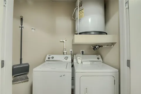a view of a chair and table in the balcony