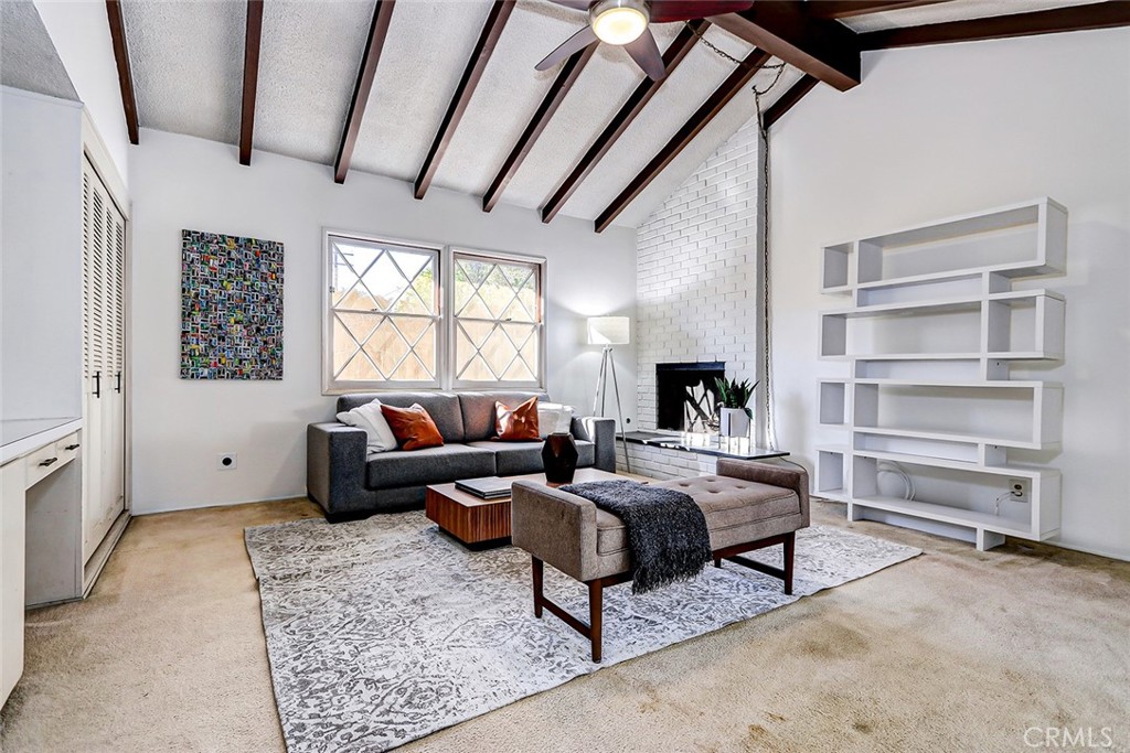 2861 Channing Way Rossmoor, CA 90720 - Photo 14 of 39 a living room with furniture and a window