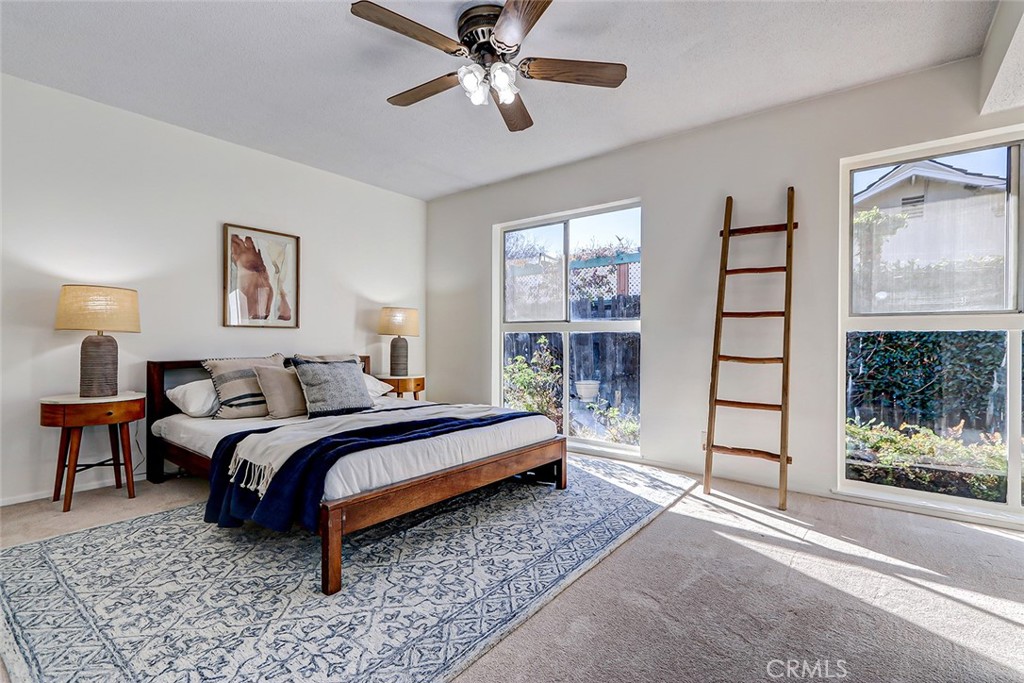 2861 Channing Way Rossmoor, CA 90720 - Photo 17 of 39 a bed room with a bed and a window