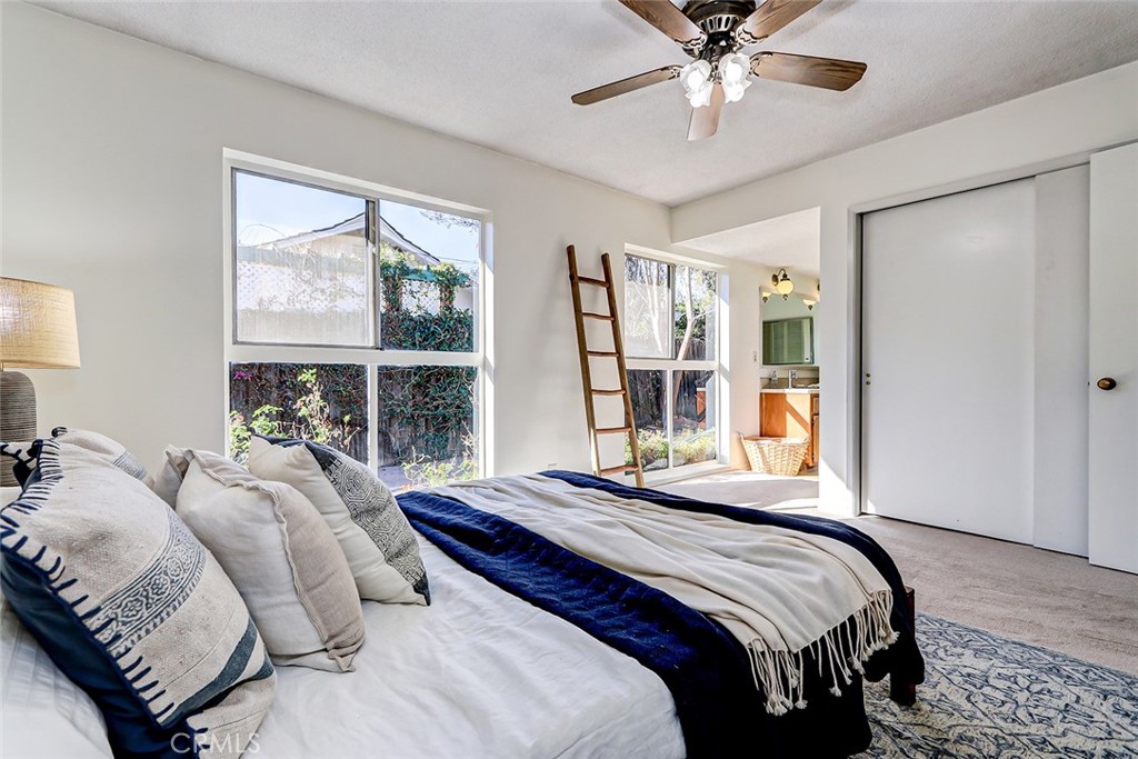 2861 Channing Way Rossmoor, CA 90720 - Photo 18 of 39 a bedroom with a bed and window