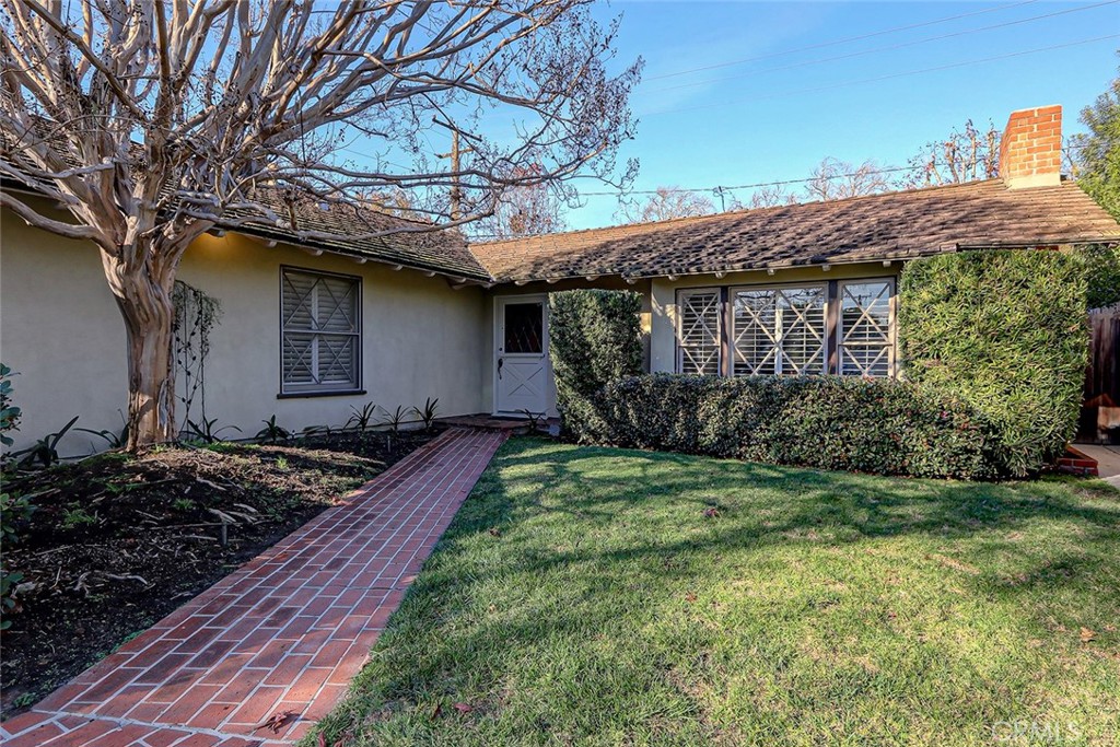 2861 Channing Way Rossmoor, CA 90720 - Photo 2 of 39 a front view of a house with garden