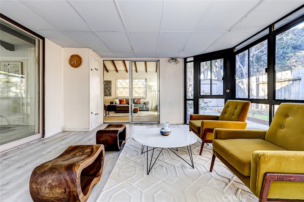 2861 Channing Way Rossmoor, CA 90720 - Photo 30 of 39 a living room with furniture and a large window