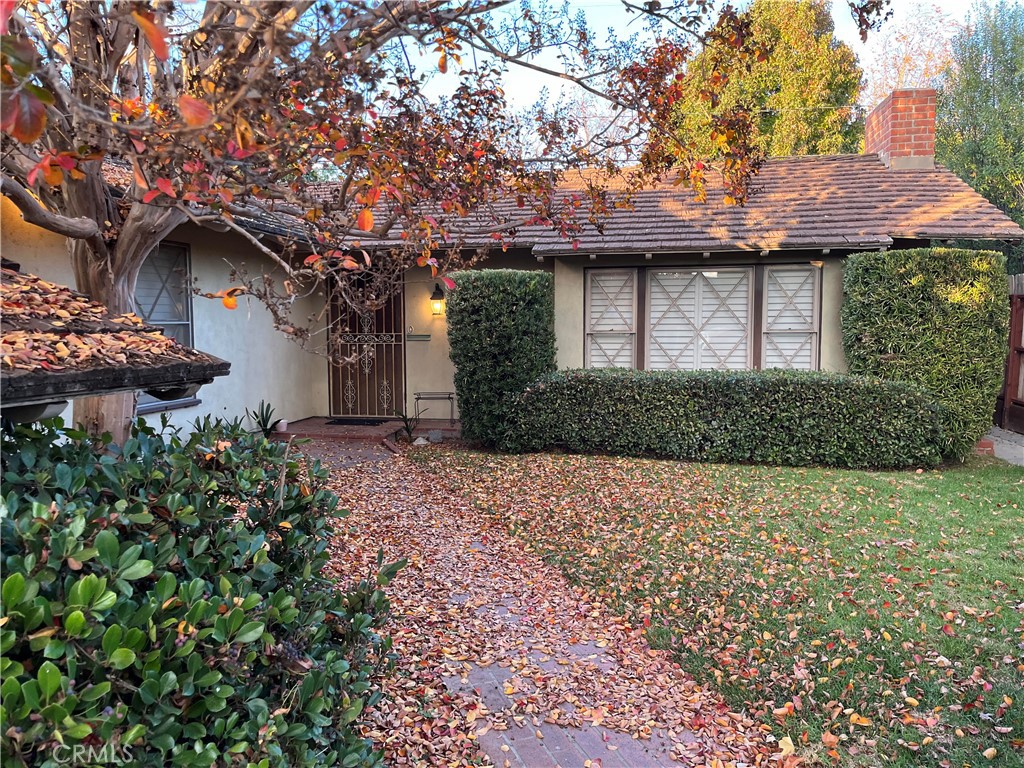 2861 Channing Way Rossmoor, CA 90720 - Photo 39 of 39 a front view of a house with a garden
