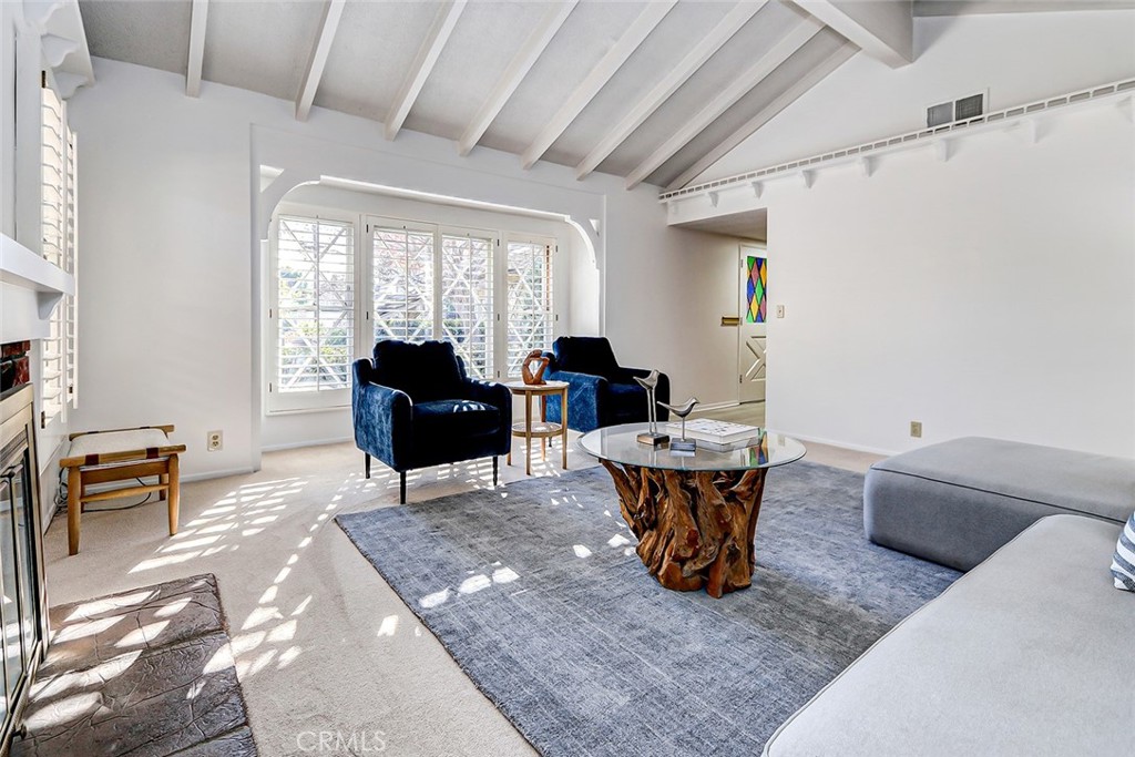2861 Channing Way Rossmoor, CA 90720 - Photo 4 of 39 a living room with furniture and a large window