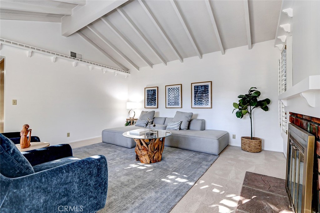 2861 Channing Way Rossmoor, CA 90720 - Photo 5 of 39 a living room with furniture potted plant and a window