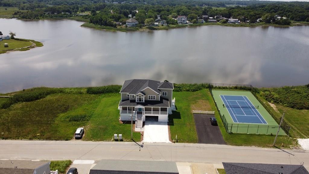 70 Surfside Road Scituate, MA 02066 - Photo 6 of 32 an aerial view of a house with a lake view