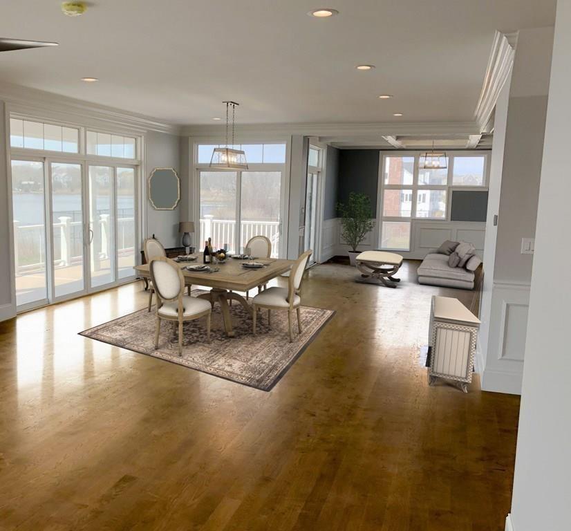 70 Surfside Road Scituate, MA 02066 - Photo 9 of 32 a view of a dining room with furniture wooden floor and a floor to ceiling window