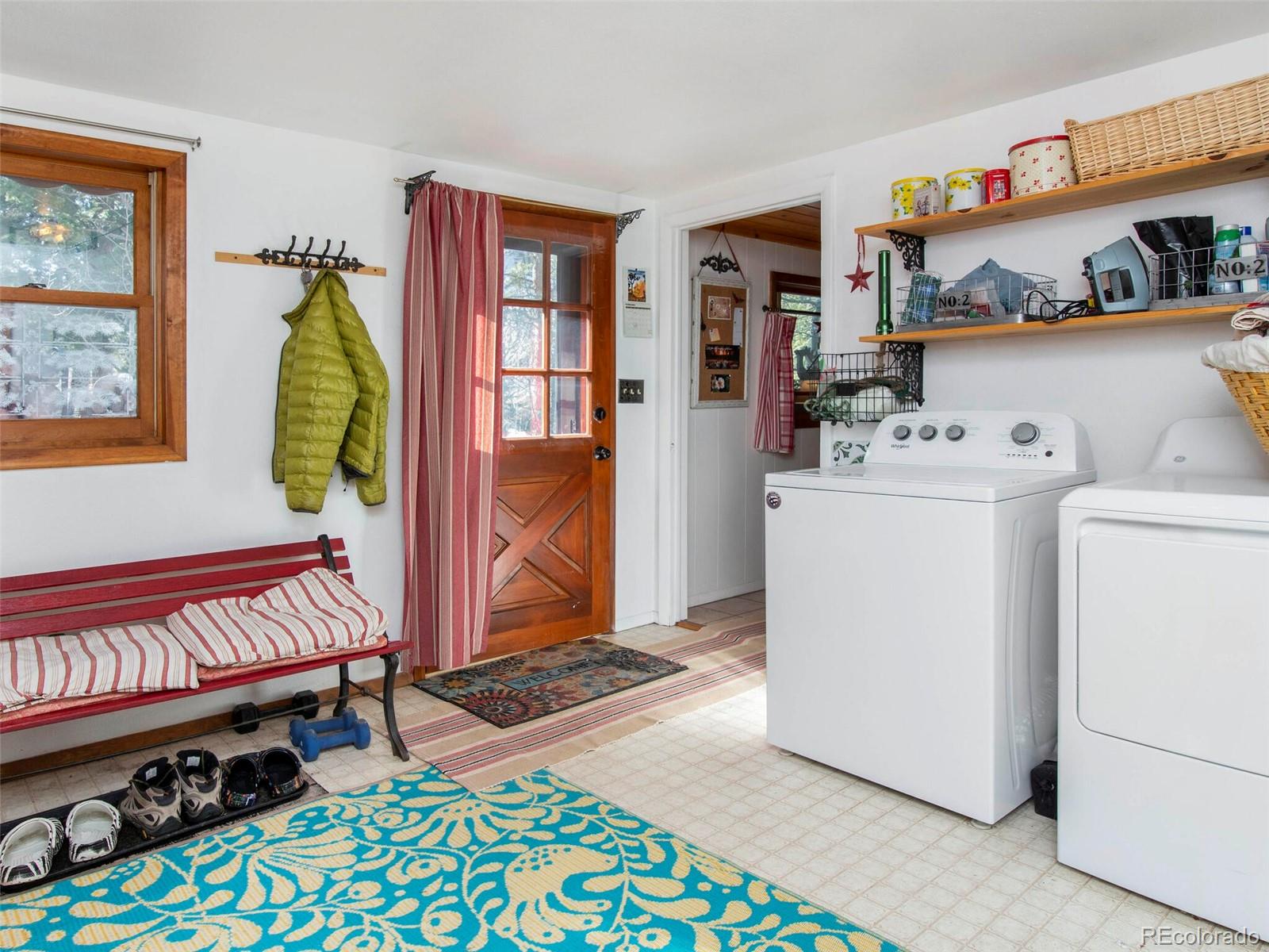 3135 Riverside Drive Lyons, CO 80540 - Photo 27 of 37 a view of a bedroom with baby crib and hanging floor