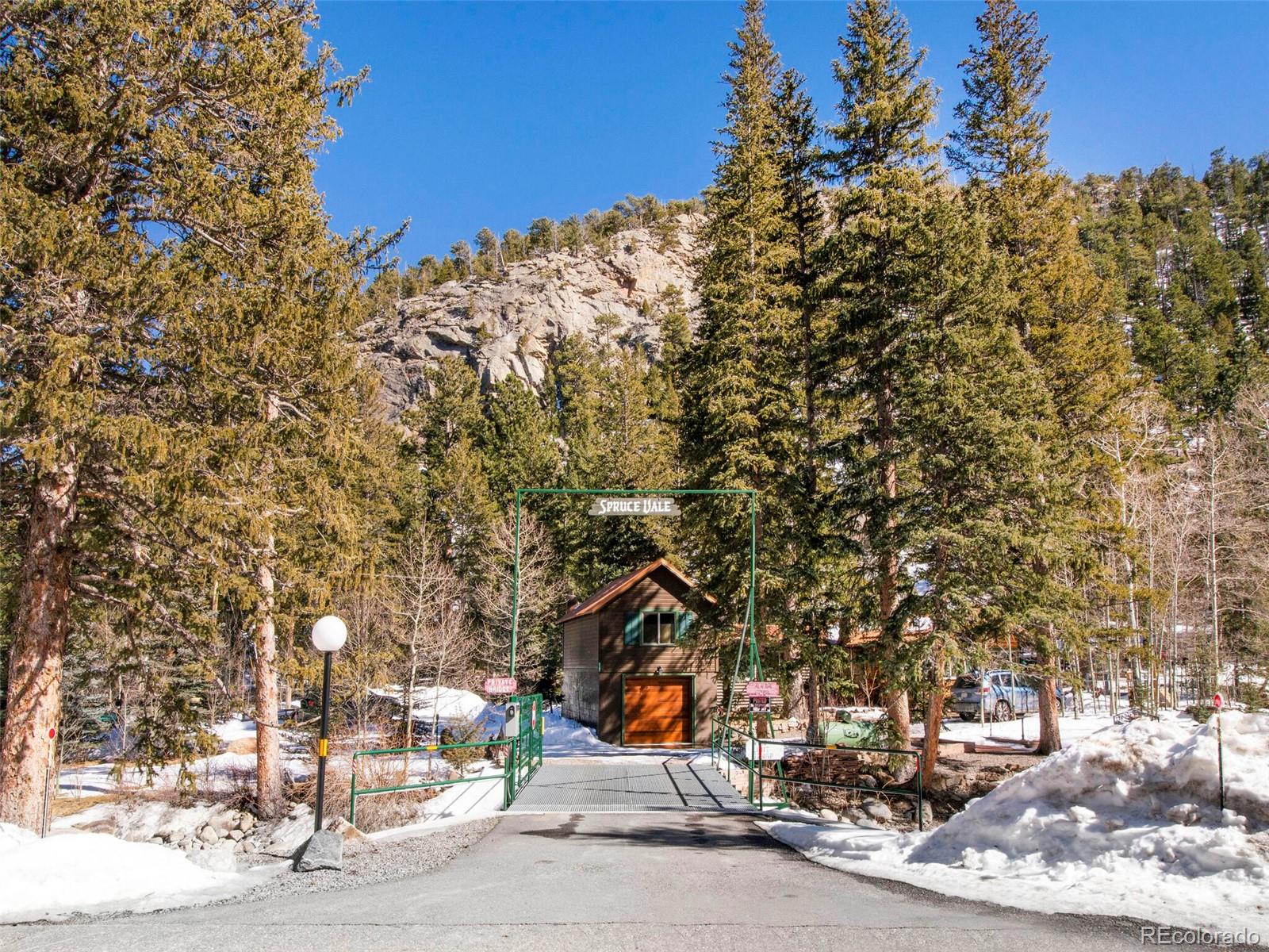 3135 Riverside Drive Lyons, CO 80540 - Photo 3 of 37 a view of a park with large trees