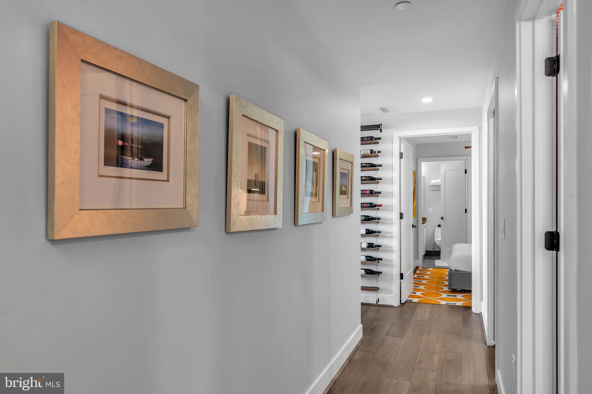 1300 4th Street Southeast, Unit PH2 Washington, DC 20003 - Photo 5 of 60 Long hallways that lead to spacious bedrooms.