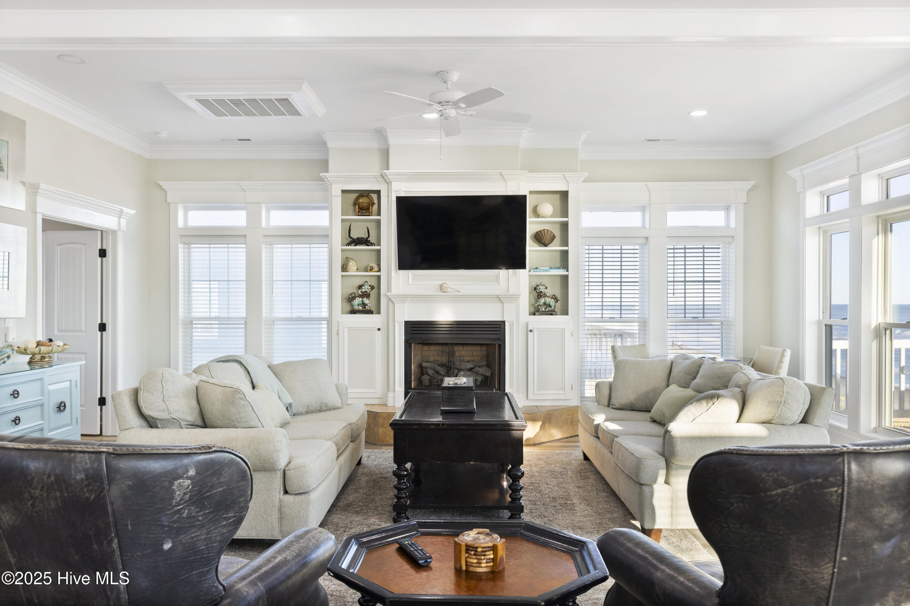 Cozy fireplace anchors the living space