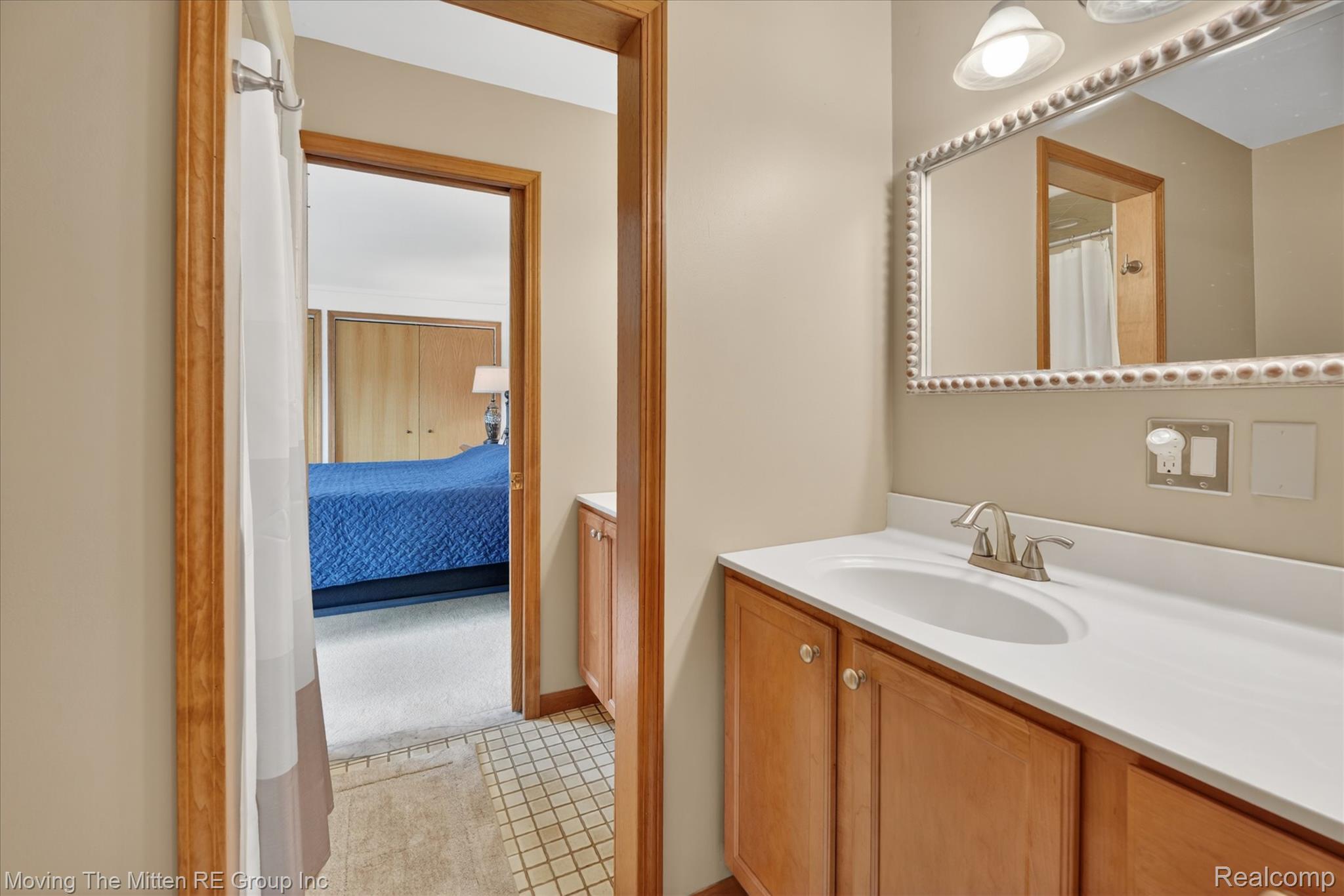 41825 Fret Road Belleville, MI 48111 - Photo 22 of 67 Full bathroom featuring vanity, ensuite bathroom, and curtained shower