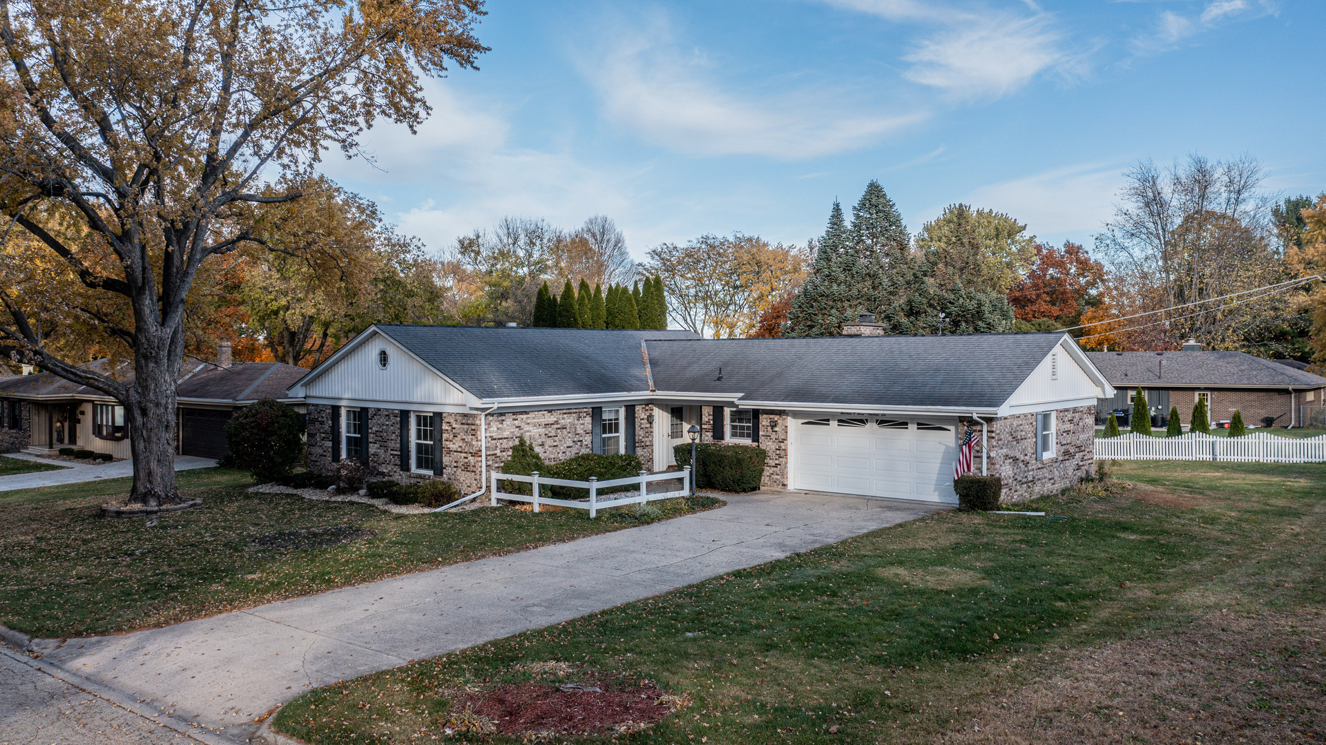 1403 Timothee Lane Mendota, IL 61342 - Photo 1 of 28 a front view of a house with garden