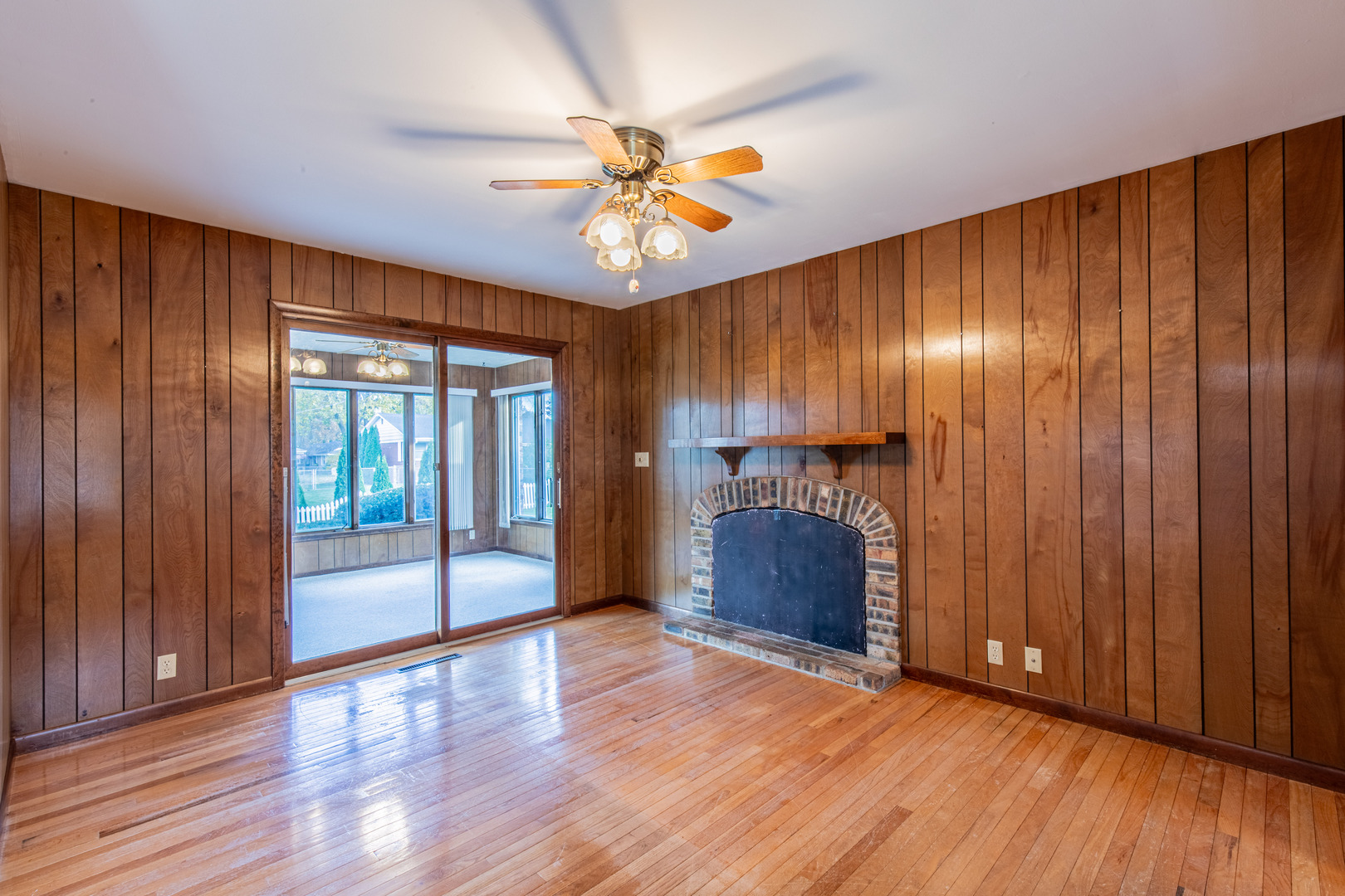 1403 Timothee Lane Mendota, IL 61342 - Photo 9 of 28 a view of an empty room with wooden floor and a window
