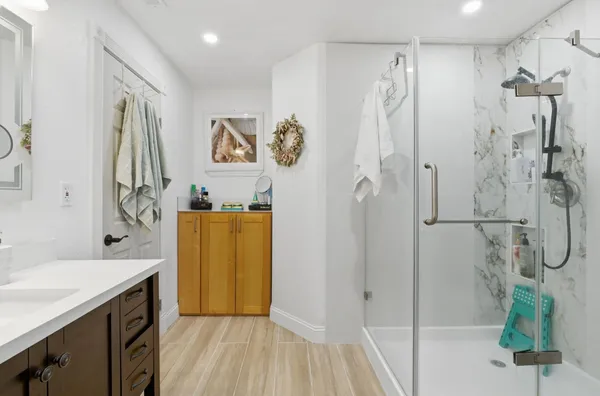 a bedroom with a bed and closet