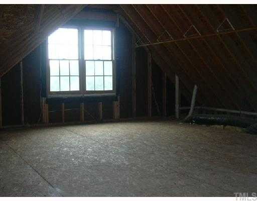 9420 Stone Mountain Road Raleigh, NC 27613 - Photo 12 of 12 a view of an empty room with a window