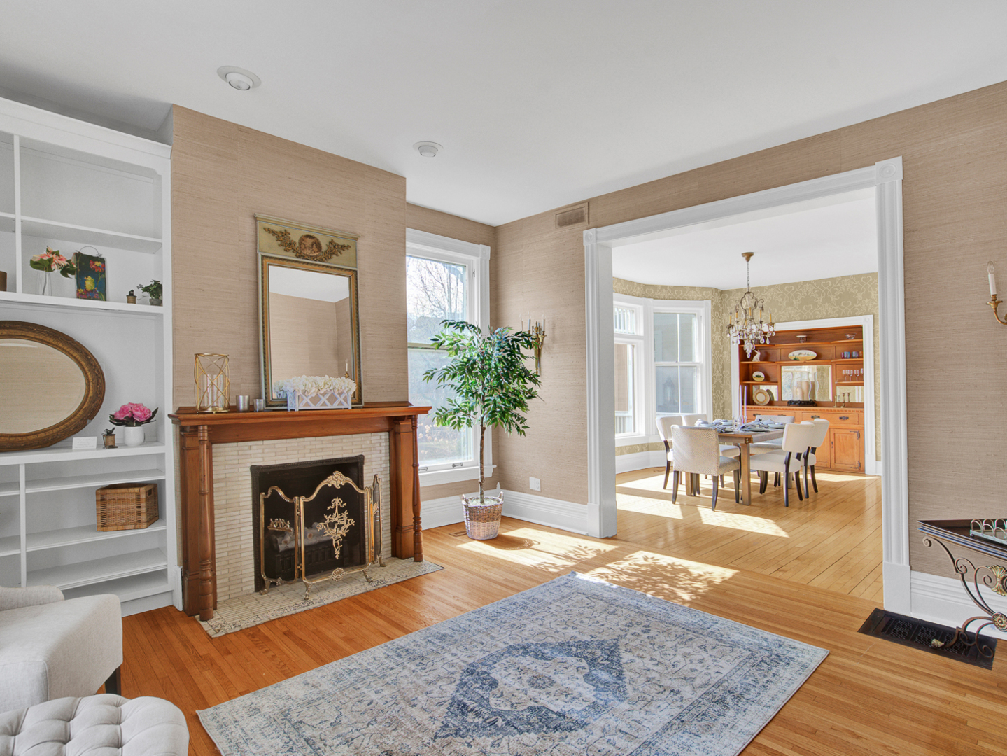 22 Orchard Place Hinsdale, IL 60521 - Photo 12 of 34 a living room with furniture and a fireplace