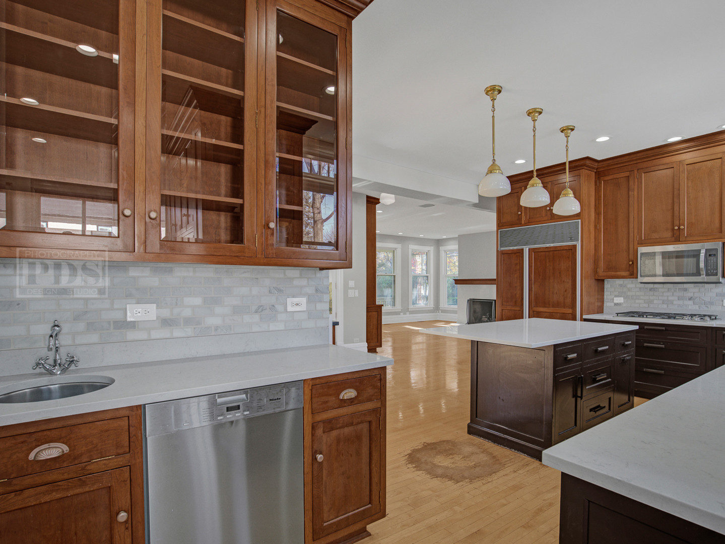 22 Orchard Place Hinsdale, IL 60521 - Photo 18 of 34 a kitchen with stainless steel appliances granite countertop a sink and a stove