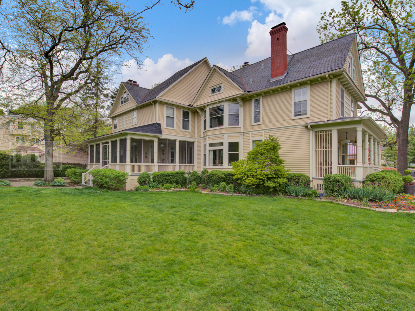 22 Orchard Place Hinsdale, IL 60521 - Photo 3 of 34 a front view of a house with a yard and trees
