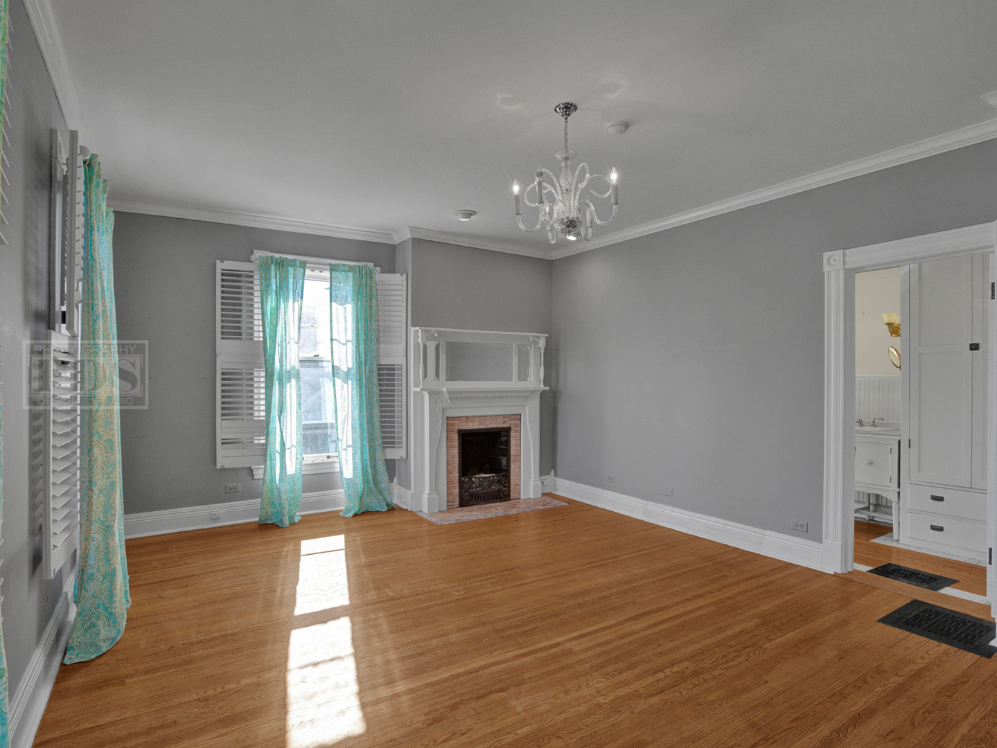 22 Orchard Place Hinsdale, IL 60521 - Photo 26 of 34 a view of a livingroom with a fireplace window and wooden floor