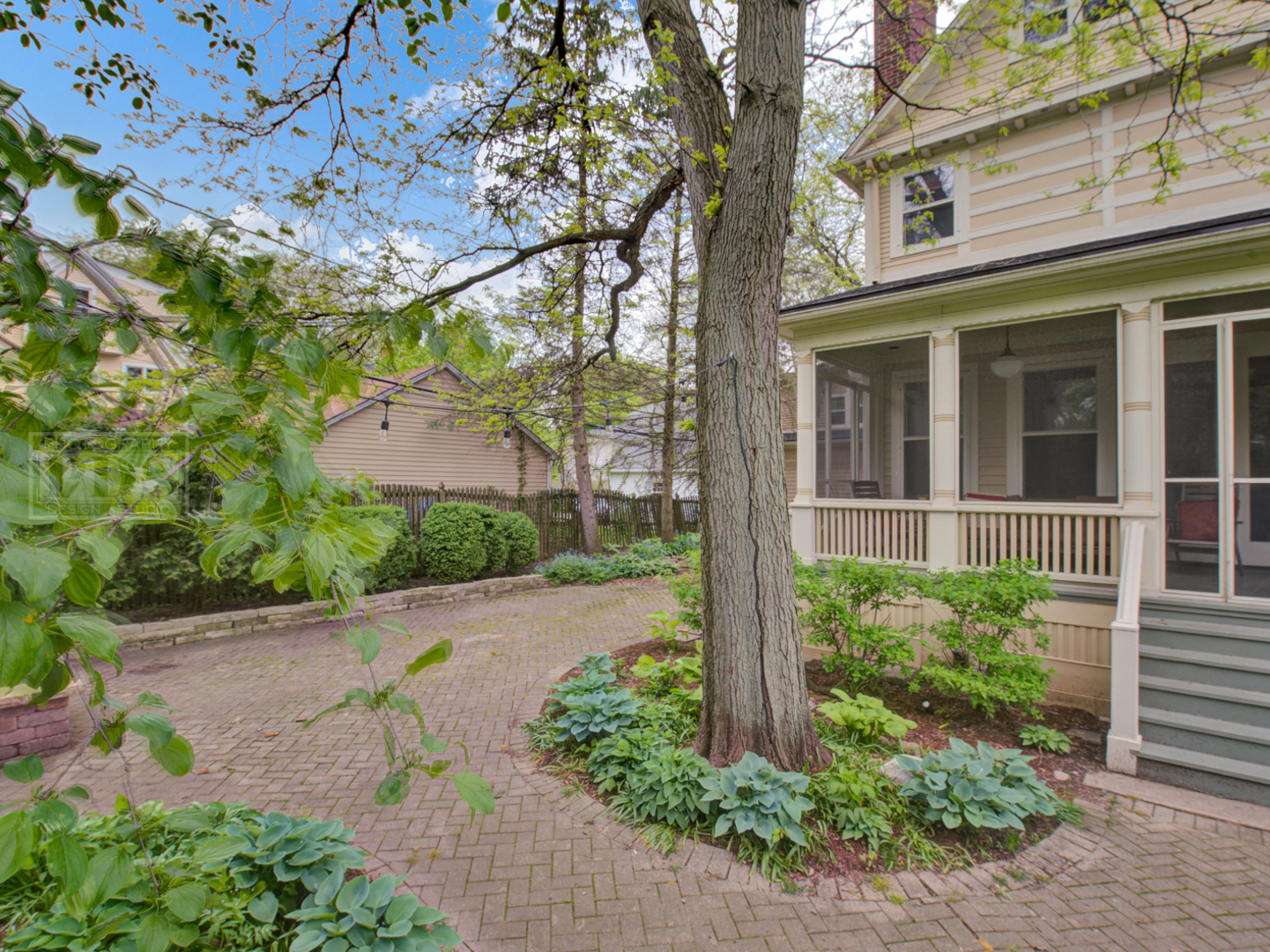 22 Orchard Place Hinsdale, IL 60521 - Photo 5 of 34 front view of a house with a garden